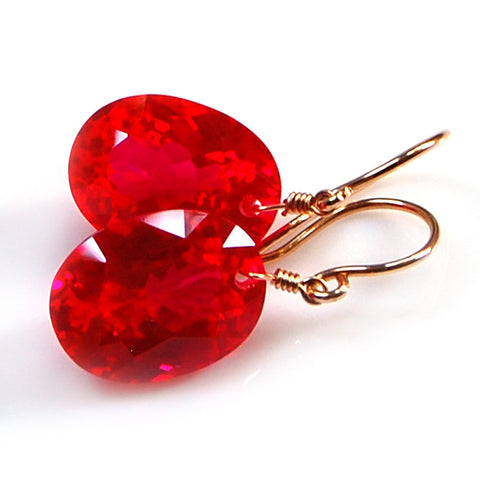 Red Topaz Oval Cut Solitaire Earrings
