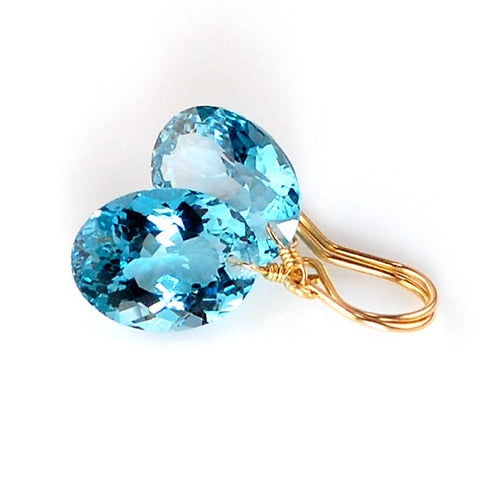 oval cut blue topaz earrings