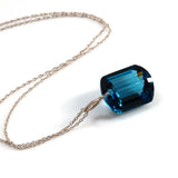white gold emerald cut London blue topaz necklace
